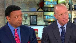 Kelly Wright, left, and lawyer Douglas Wigdor (CBS News)